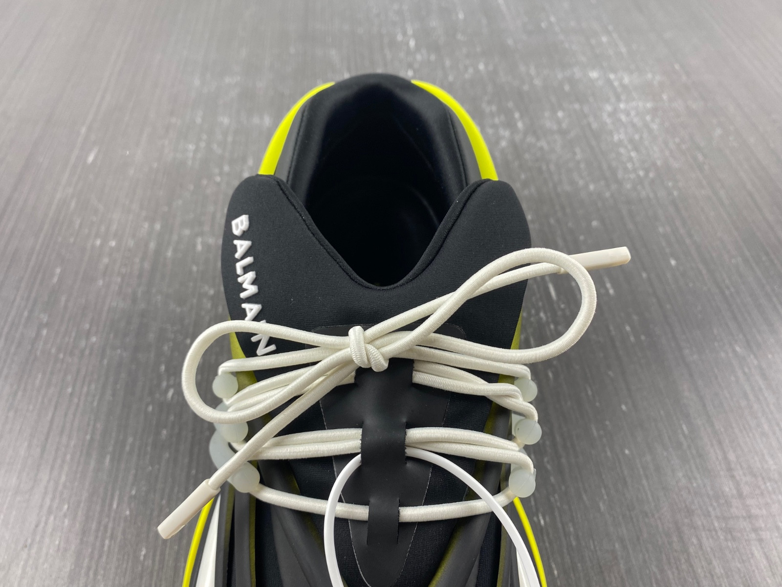 BALMAIN NEOPRENE AND LEATHER UNICORN LOW-TOP SNEAKERS